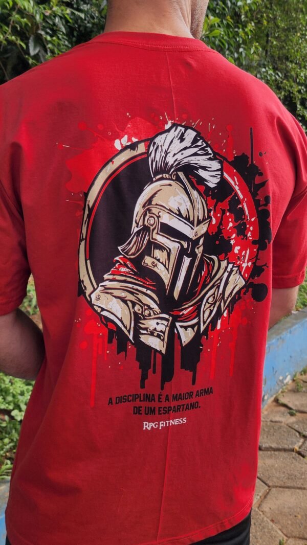 15403363962-20250320-171600.jpg CAMISETA OVERSIZED A DISCIPLINA É A MAIOR ARMA DE UM ESPARTA